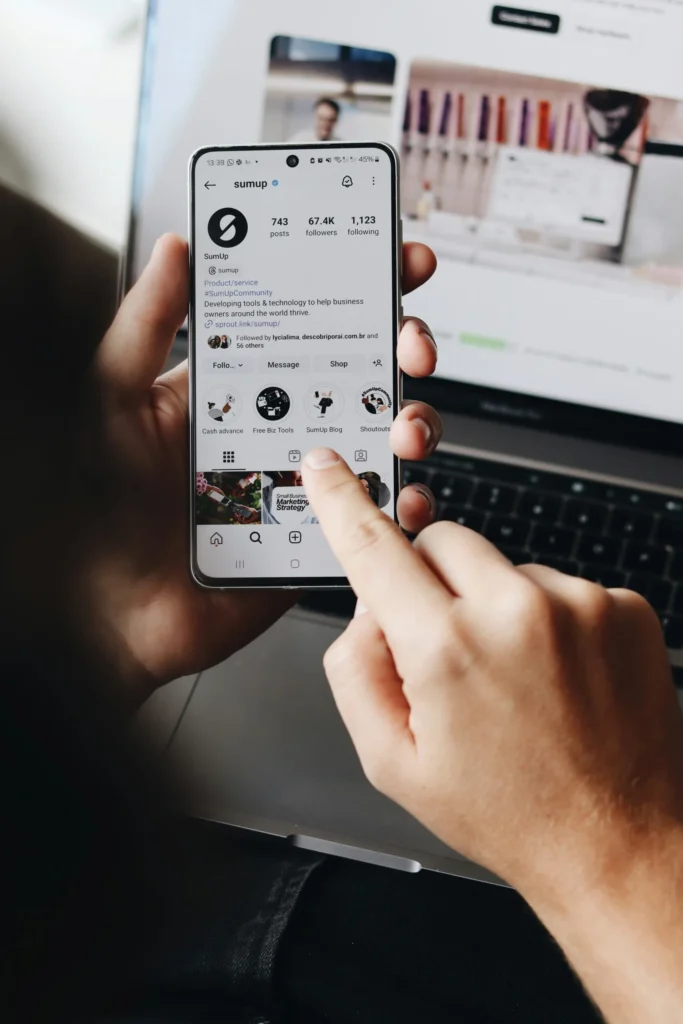 person holding phone with IG open